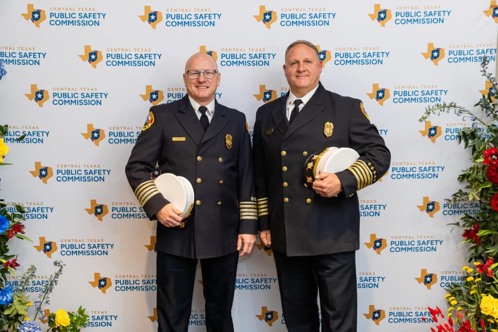 Central Texas Public Safety Commission officials smiling.