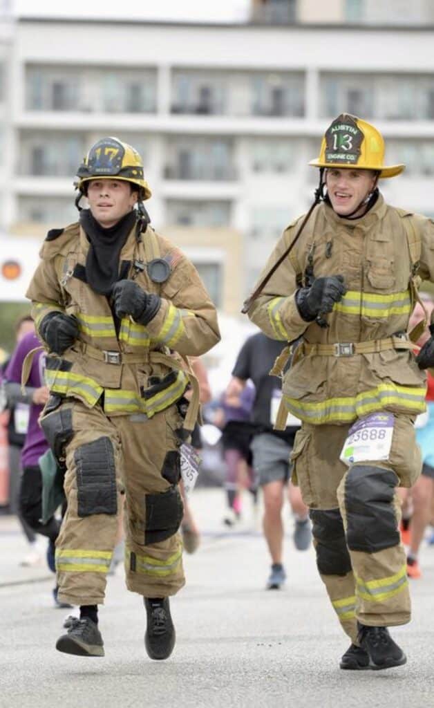 Firefighters running in a race event.